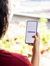 Assam, india - Augest 9, 2020 : Samsung logo on a phone screen stock image.