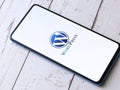 Assam, india - Augest 2, 2020 : Wordpress logo on a smartphone screen. WordPress is a open source software to host website.