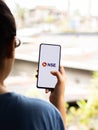 Assam, india - August 27, 2020 : NSE logo on phone screen stock image. Royalty Free Stock Photo