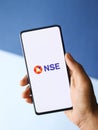 Assam, india - August 27, 2020 : NSE logo on phone screen stock image.