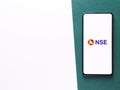 Assam, india - August 27, 2020 : NSE logo on phone screen stock image.