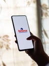 Assam, india - August 27, 2020 : Reliance industries logo on phone screen stock image.