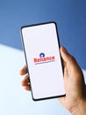 Assam, india - August 27, 2020 : Reliance industries logo on phone screen stock image.