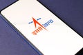 Assam, india - December 20, 2020 : Indian Space Research Organisation (ISRO) logo on phone screen stock image.