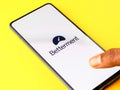 Assam, india - February 19, 2021 : Betterment logo on phone screen stock image.