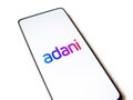 Assam, india - January 15, 2020 : Adani logo on phone screen stock image.
