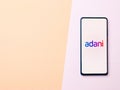 Assam, india - January 15, 2020 : Adani logo on phone screen stock image.