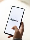 Assam, india - January 15, 2020 : Dribbble logo on phone screen stock image.