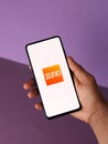 Assam, india - March 10, 2021 : Audible Suno logo on phone screen stock image. Royalty Free Stock Photo