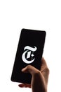 Assam, india - November 29, 2020 : The New York Times logo on phone screen stock image. Royalty Free Stock Photo