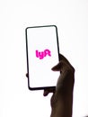 Assam, india - September 18, 2020 : Lyft logo on phone screen stock image.