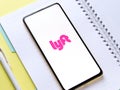 Assam, india - September 18, 2020 : Lyft logo on phone screen stock image.