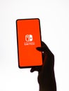 Assam, india - September 24, 2020 : Nintendo switch logo on phone screen stock image.