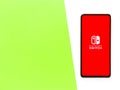 Assam, india - September 24, 2020 : Nintendo switch logo on phone screen stock image.