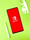 Assam, india - September 24, 2020 : Nintendo switch logo on phone screen stock image.