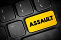 Assault - act of committing physical harm or unwanted physical contact upon a person, text button on keyboard, concept background