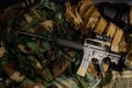 Assault rifle, pistol, grenade with tactical chest rigs and ammunition Royalty Free Stock Photo