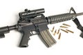 Assault Rifle with Scope & Bullets on White Royalty Free Stock Photo