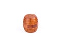 Assembled wooden puzzle barrel isolated on a white background