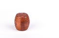 Assembled wooden puzzle barrel isolated on a white background