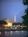 Assemblee Nationale and Eiffel Tower at night.