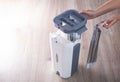 Assembling a bucket with a modern mop with a wringer for easy cleaning. Copy space for text, rinsing the mop Royalty Free Stock Photo