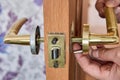 Assembling mechanism of door handle with latch. Royalty Free Stock Photo