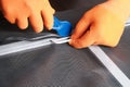 Assembling mosquito net for window, installing seal in an aluminum profile