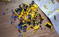 Assembling a toy constructor by a child. Colorful construction kit for boys and children