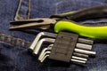 Assembly of furniture tools, hexahedral, kits and pasatizhi with a green handle Royalty Free Stock Photo