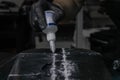 Assembling 3D printed parts with cyanoacrylate glue. Using a syringe for precision. Royalty Free Stock Photo