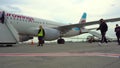 assengers are traveling. Arrival at the airport. Flight. Eurowings plane. Many people in masks and with suitcases travel