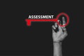 assessment with key on black Royalty Free Stock Photo