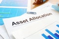 Asset allocation. Financial documents and pen. Royalty Free Stock Photo