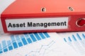 Asset Management. Binder data finance report business with graph analysis in office Royalty Free Stock Photo