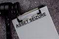 Asset Seizure text write on a paperwork isolated on office desk