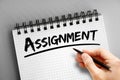 Assignment text on notepad, concept background Royalty Free Stock Photo