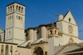 Church of San Francesco in Assisi with the stone wall. The basilica built in Gothic style houses the frescoes by Giotto