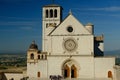 Church of San Francesco in Assisi with the stone wall. The basilica built in Gothic style houses the frescoes by Giotto