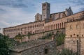 Assisi, Umbria, Italy - Panoramic view of Basilica of Saint Francis of Assisi with christmas tree at dusk Royalty Free Stock Photo