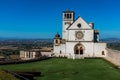 Assisi, Umbria, Italy, September, 14, 2017: The lawn in front of St Francis of Assisi Church in Assisi, Umbria, Italy against a Royalty Free Stock Photo