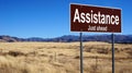 Assistance brown road sign Royalty Free Stock Photo