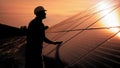 Assistance technical worker in uniform is checking an operation and efficiency performance of photovoltaic solar panels Royalty Free Stock Photo