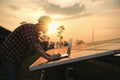 Assistance technical worker in uniform is checking an operation and efficiency performance of photovoltaic solar panels Royalty Free Stock Photo