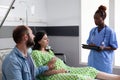 Assistant discussing childbirth process Royalty Free Stock Photo