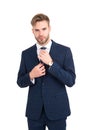 Assistant manager fix necktie wearing elegant vested blue suit in formal fashion style isolated on white, formalwear