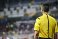 The Assistant referee during the UEFA Europa League game between Royalty Free Stock Photo