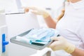 Assistant with sterile dentist tools Royalty Free Stock Photo