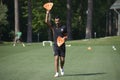 Assistant trainer setting marks on the soccer field. Shakhtar soccer team