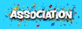 Association sign over colorful cut out foil ribbon confetti background